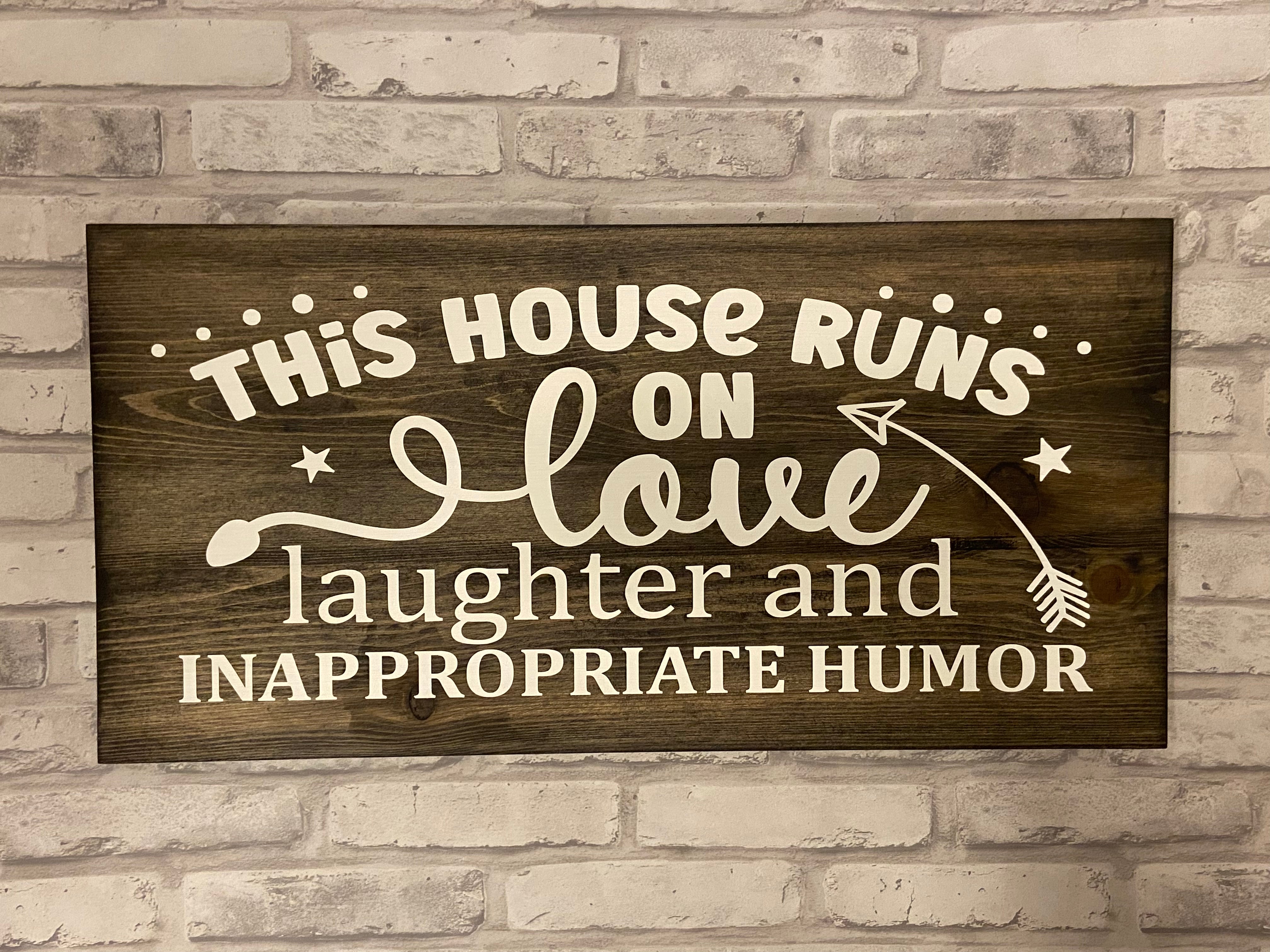 “This house runs on” Sign