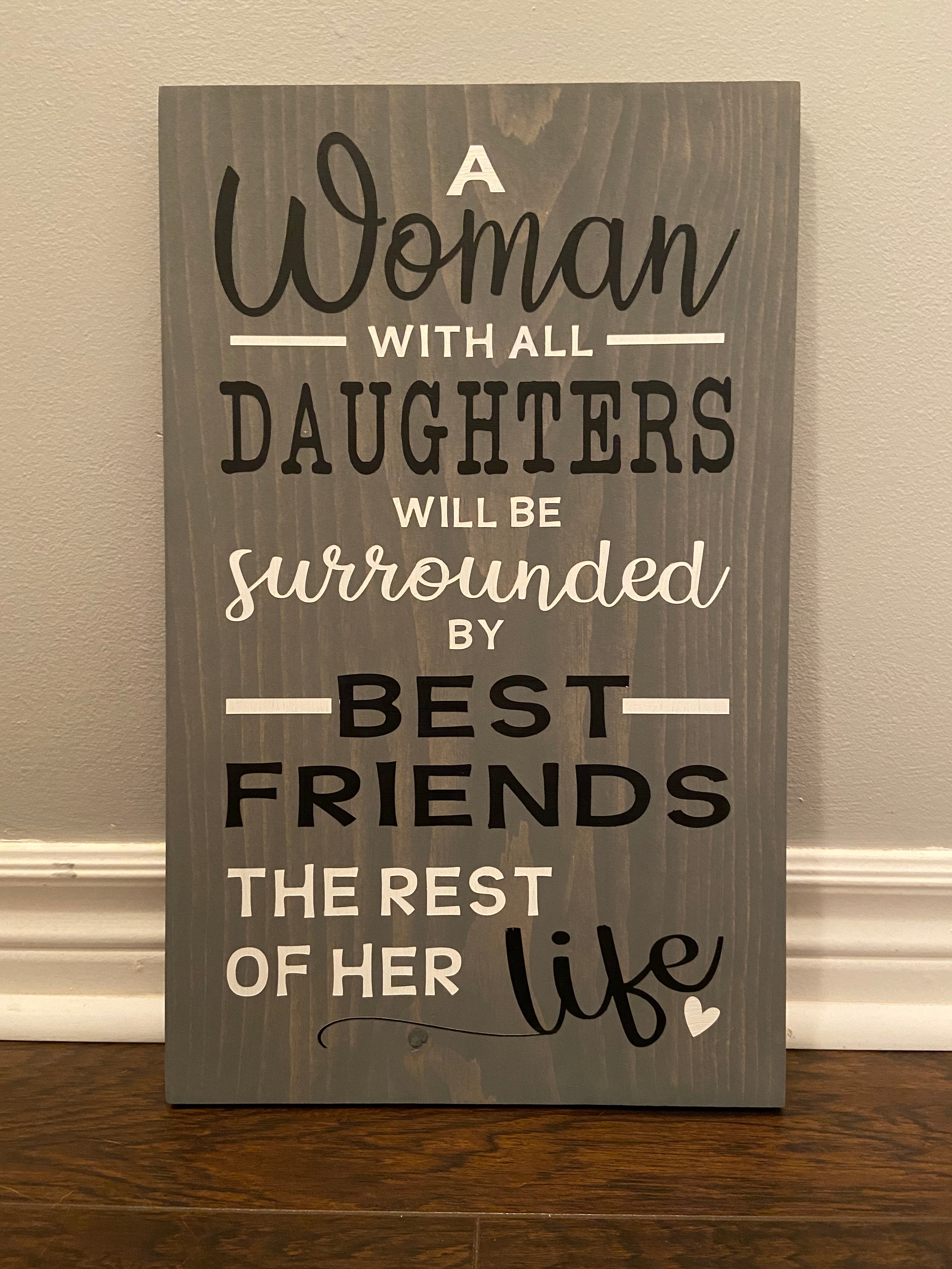 Woman with all Daughters Sign